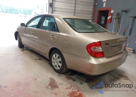2002 Toyota Camry Le from USA, damaged, VIN 4T1BE32K42U075897